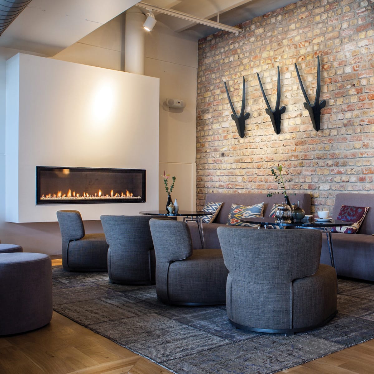 Black Wooden Antelope Heads Wall Art in Lodge Lounge