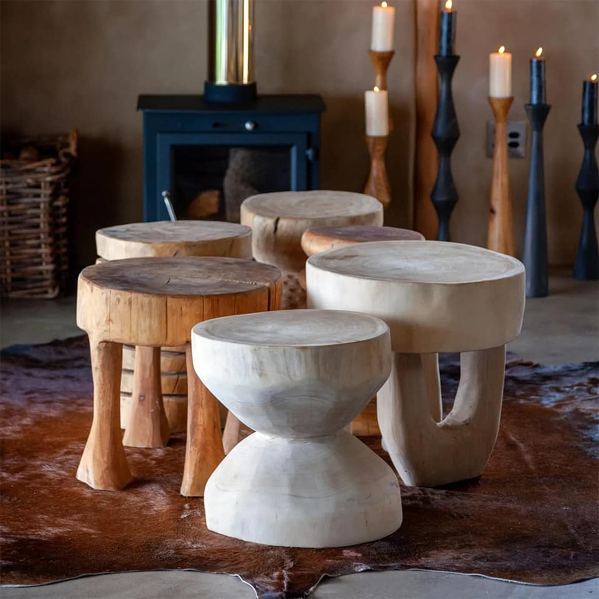 Geometric Floor Candle Holders next to fireplace