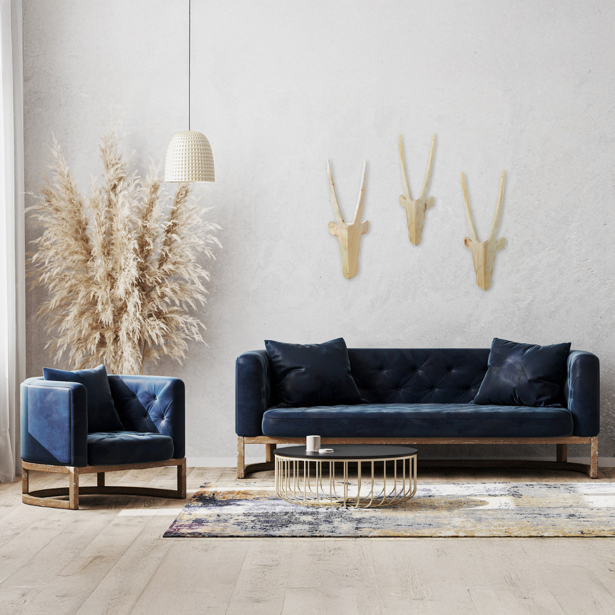 Natural Wooden Antelope Heads above couch in scandi-chic decor room